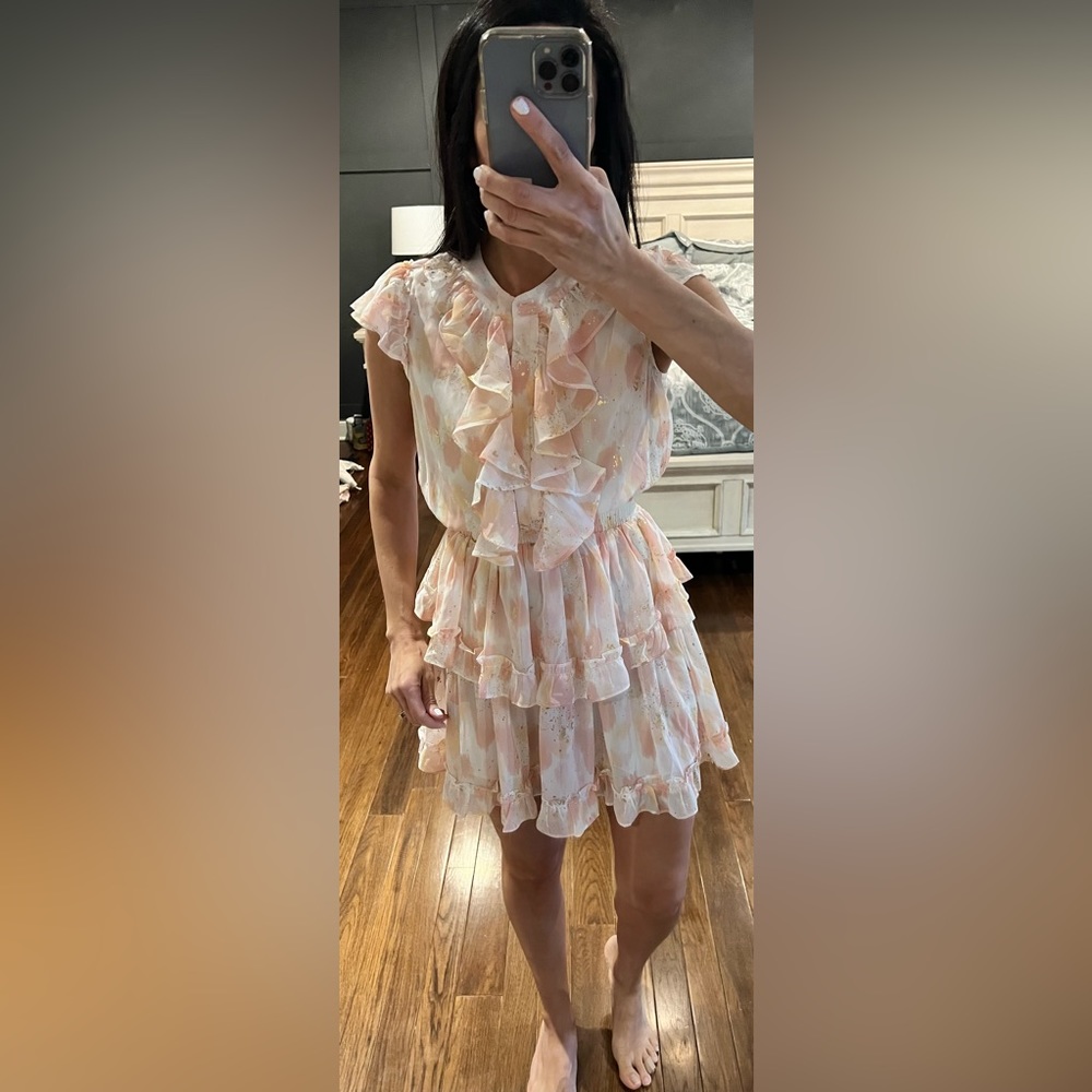 Super cute tiered ruffle dress with Cinched waist. So cute on .